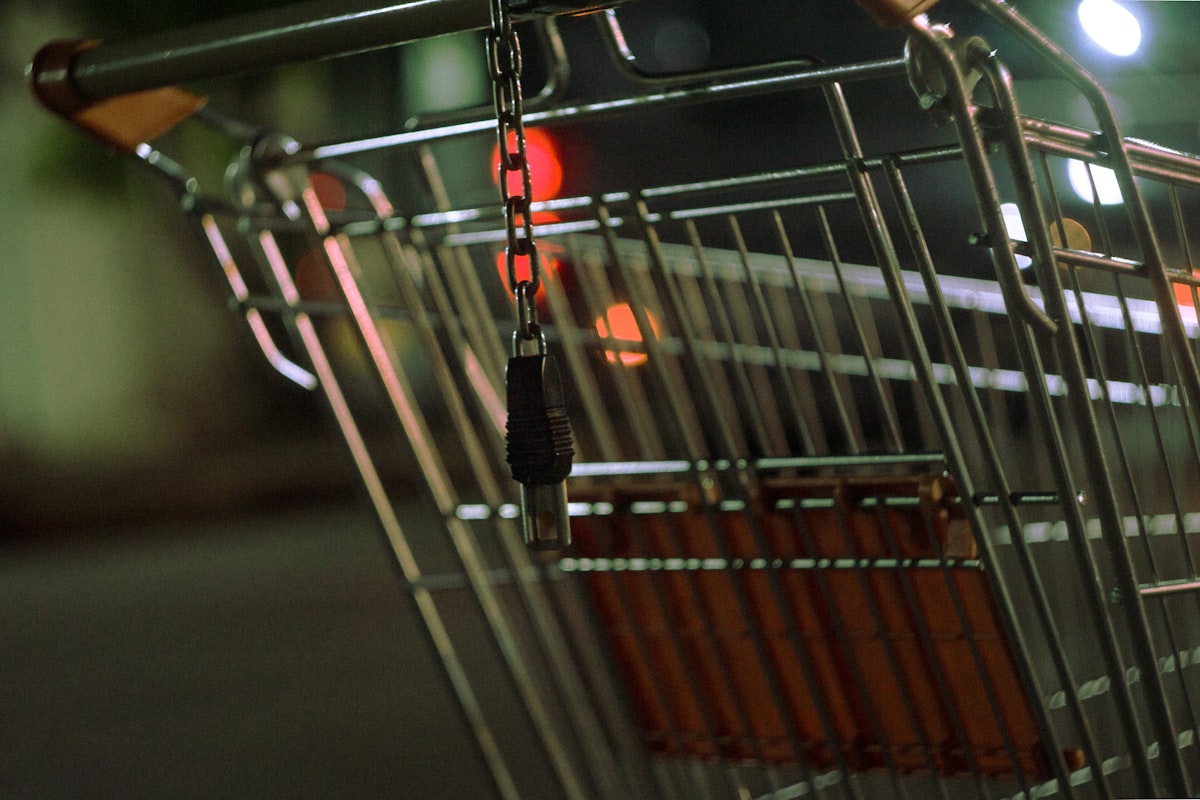A shopping trolley with a coin lock